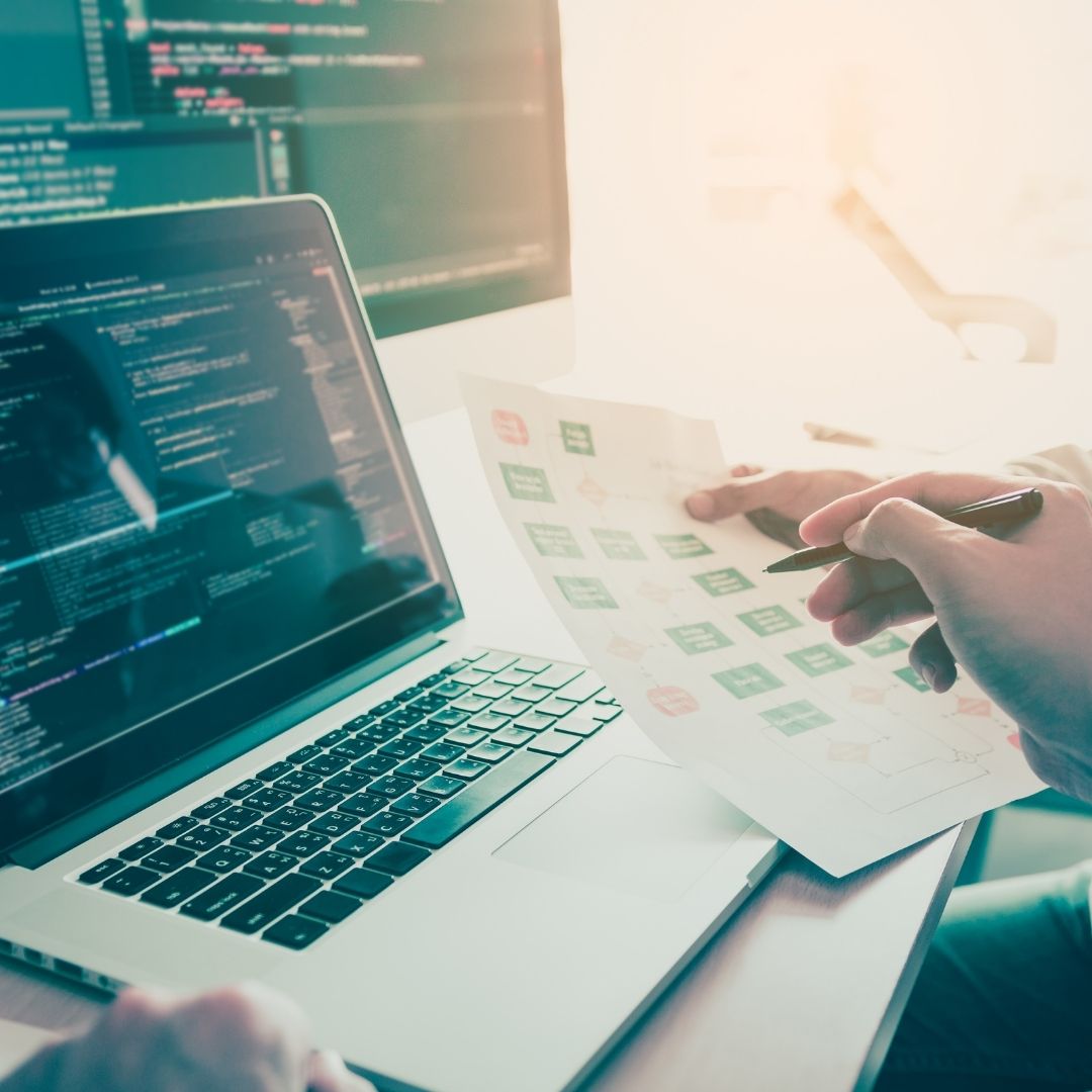 An IT worker completing work